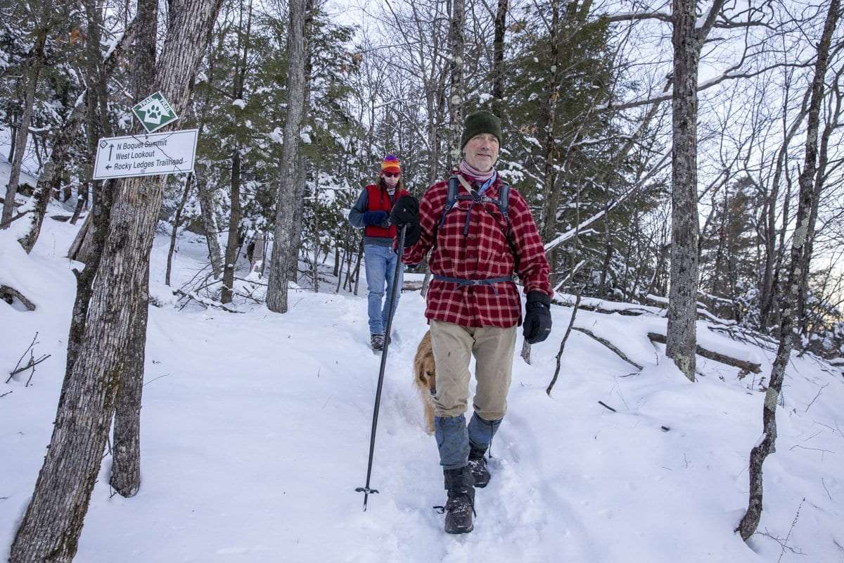 Chris Maron, executive director of CATS, hikes North Boquet Mountain. Explorer file photo by Mike Lynch