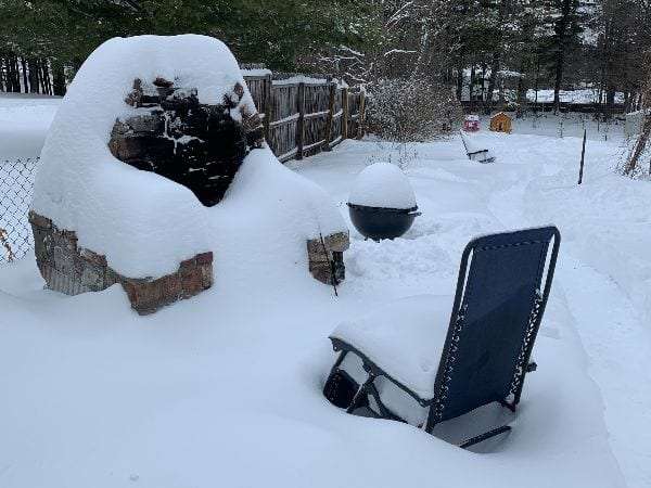 Snow on outdoor fireplace