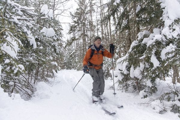 Phil Brown skis on the way to the Hurricane Mountain