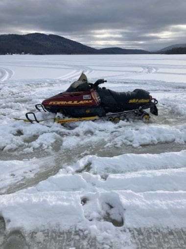 Snowmobile Stuck in Lewey Lake