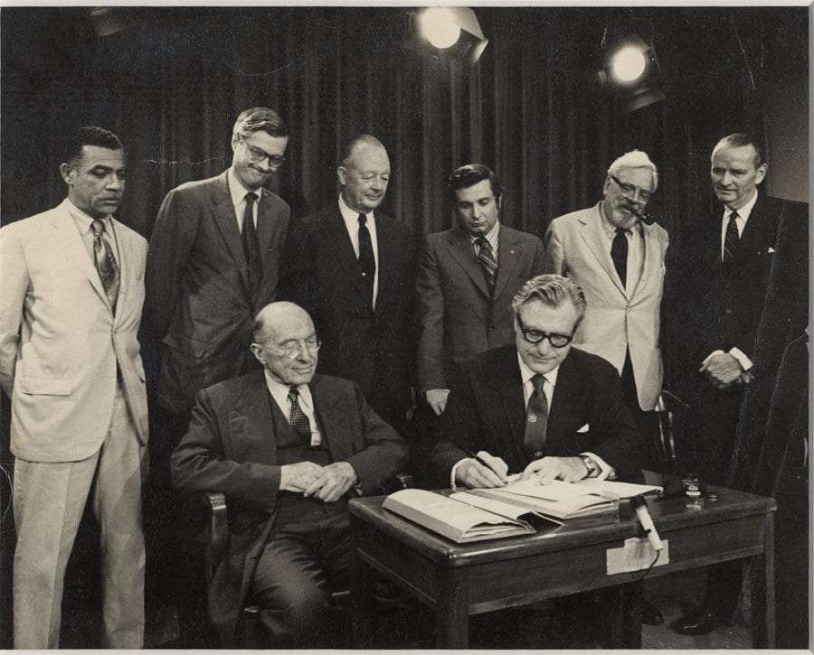 A photo of Gov. Nelson Rockefeller signing the Adirondack Park Agency Act