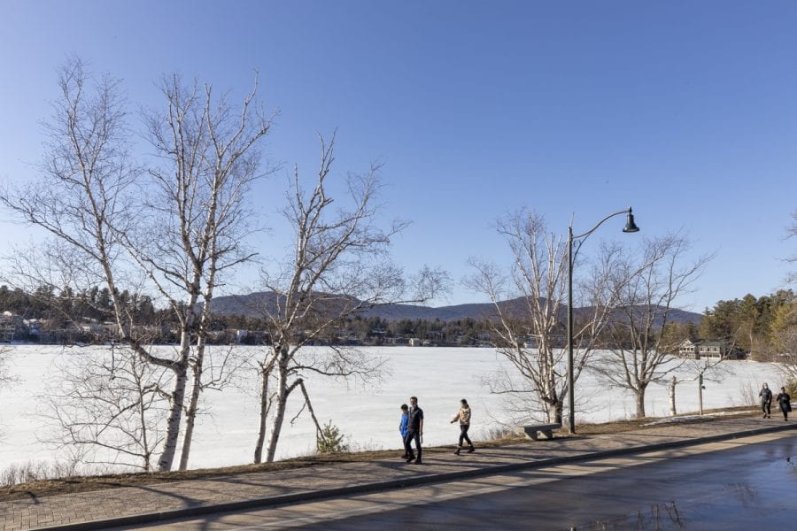 The ice-out watch on area lakes has begun with recent warm weather. Mirror Lake in Lake Placid was completely covered with ice on March 22, but should see some melting in the near future. Photo by Mike Lynch