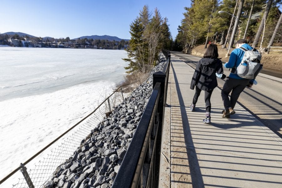 The ice-out watch on area lakes has begun with recent warm weather. Mirror Lake in Lake Placid was completely covered with ice on March 22, but should see some melting in the near future. Photo by Mike Lynch
