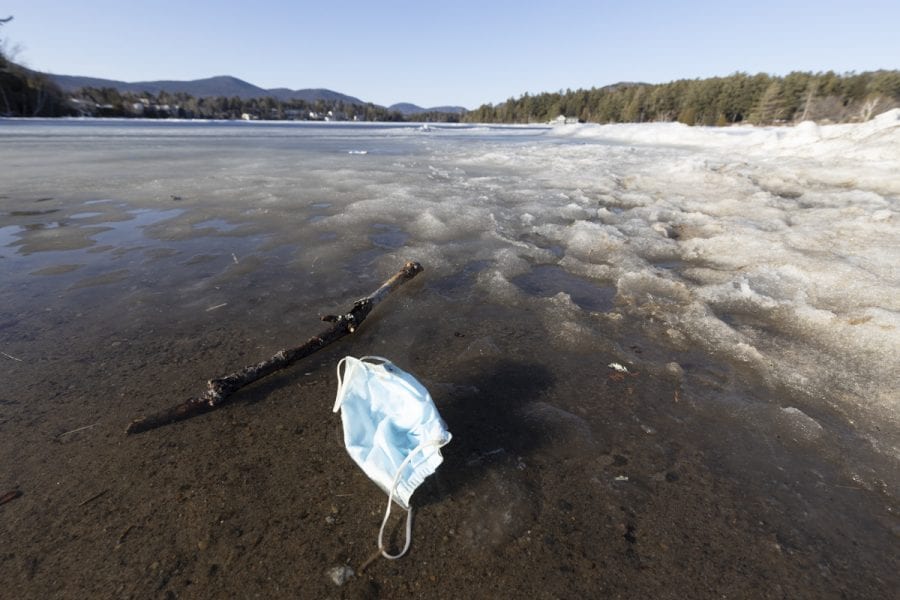 The ice out watch on area lakes has begun with recent warm weather. Mirror Lake in Lake Placid was completely covered with ice on March 22, but should see some melting in the near future. Photo by Mike Lynch