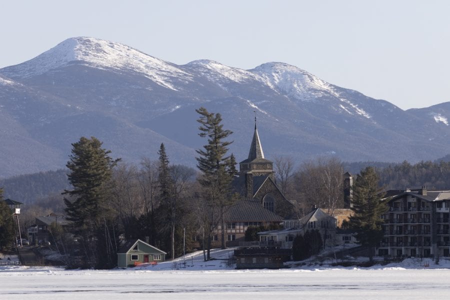 The ice out watch on area lakes has begun with recent warm weather. Mirror Lake in Lake Placid was completely covered with ice on March 22, but should see some melting in the near future. Photo by Mike Lynch