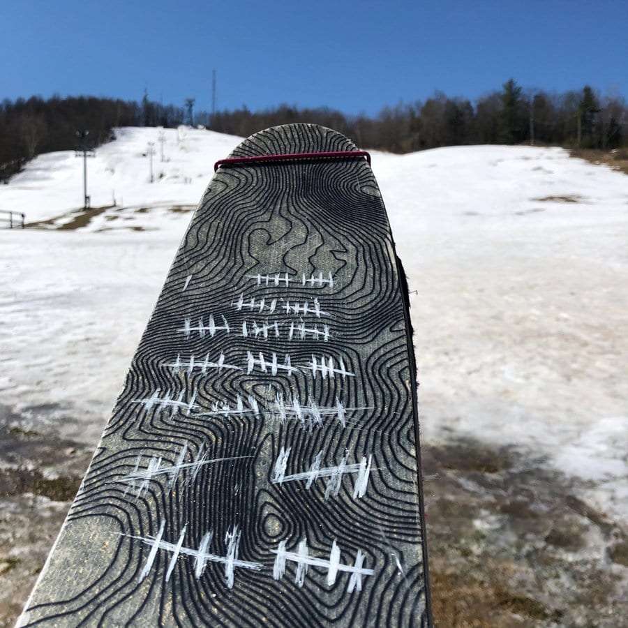 Hash marks drawn on a ski to keep track of Alex Goff laps on Mount Pisgah.