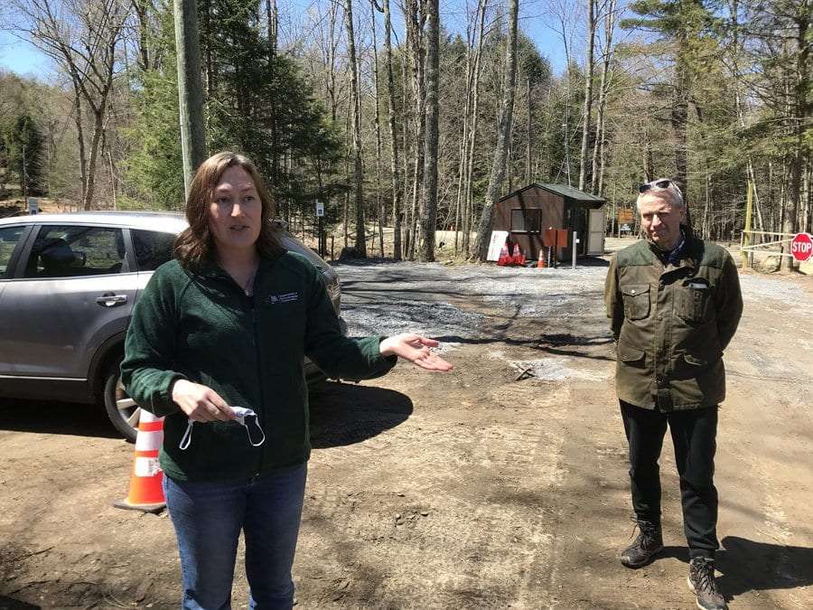 DEC Deputy Commissioner Katie Petronis discusses the reservation program at AMR's parking lot.