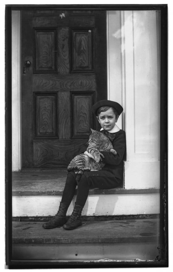 boy with cat historic photo