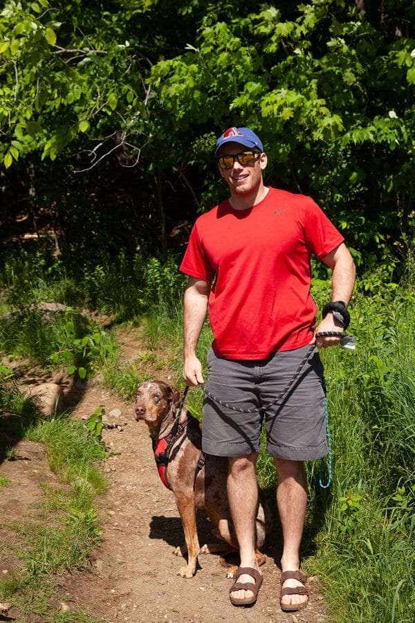 Tony Stephans hikes Baker Mountain with his dog.