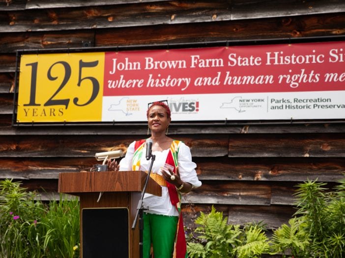 Nicole Hylton-Patterson speaks at the 125th anniversary of John Brown Farm State Historic Site.