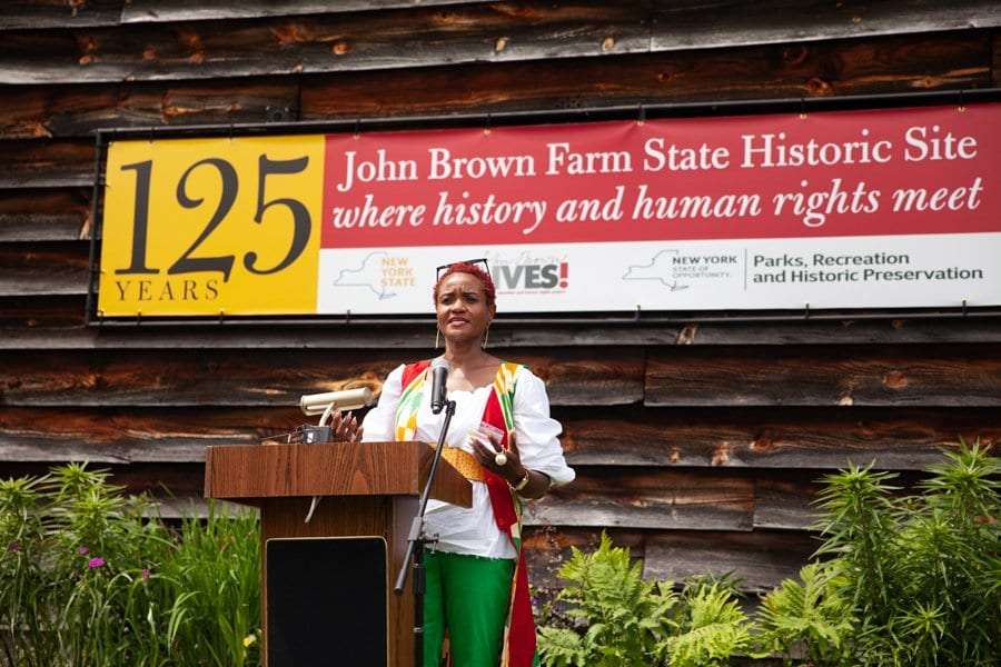 Nicole Hylton-Patterson speaks at the 125th anniversary of John Brown Farm State Historic Site.