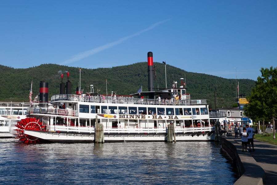 A paddleboat moored at the Lake George waterfront.