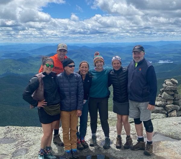 Publisher Tracy Ormsbee with friends hiking Mount Marcy.