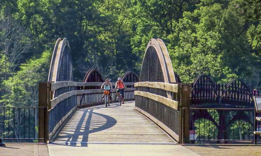 Cyclists arrive in Ohiopyle on the Great Allegheny Passage Trail. Photo by Tom Curley