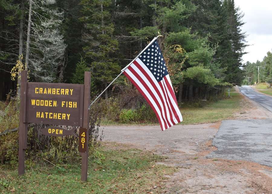 wooden fish hatchery sign