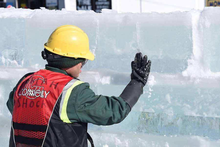 A former moriah shock inmate works on the Saranac Lake ice palace