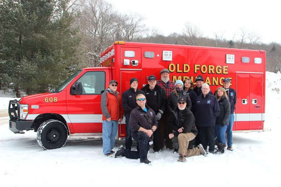 EMTs with their ambulance. Health care in Old Forge