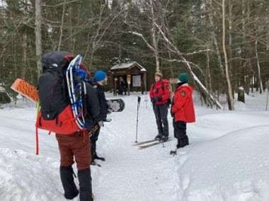 Rangers assist injured snowmobiler