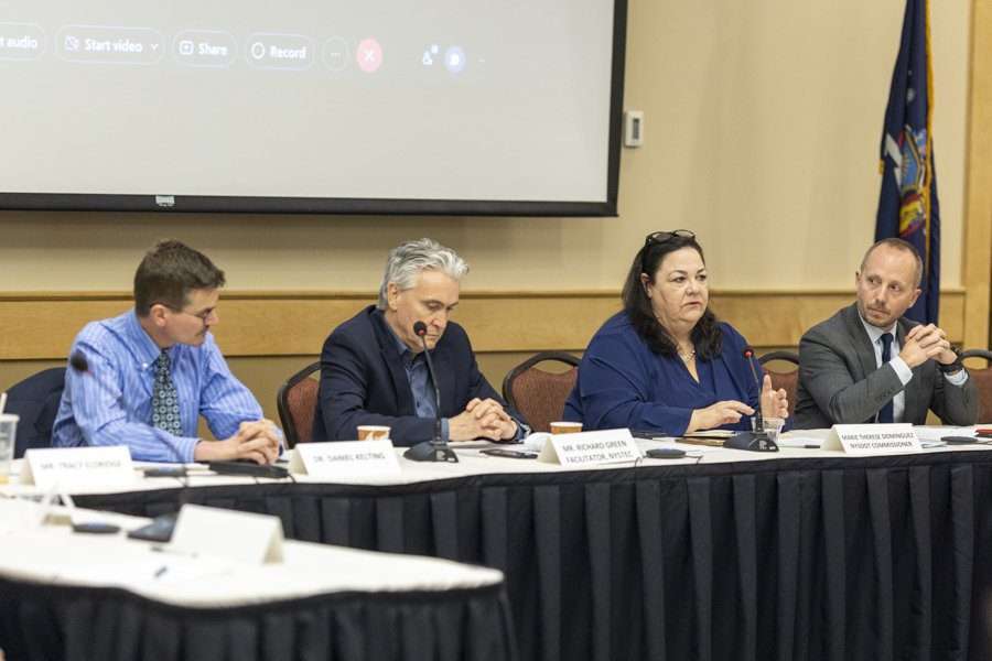 Road salt task force members from left, scientist Dan Kelting, facilitator Richard Green, Department of Transportation Commissioner Therese Dominguez, and Department of Environmental Conservation Commissioner Basil Seggos meet in Lake Placid on April 11, 2022.