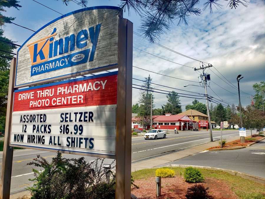 summer help wanted sign at kinney drugs