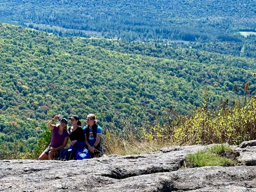 A selfie-worthy spot on haystack for three women from Illinois.