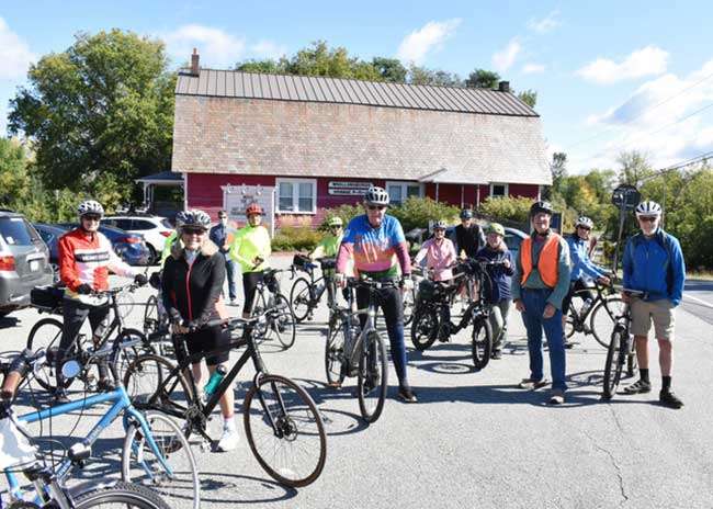 15 History and Biking Enthusiasts recently gathered at the Whallonsburg Grange for an Architectural Tour of the Boquet Valley sponsored by Adirondack Architectural Heritage (AARCH).
