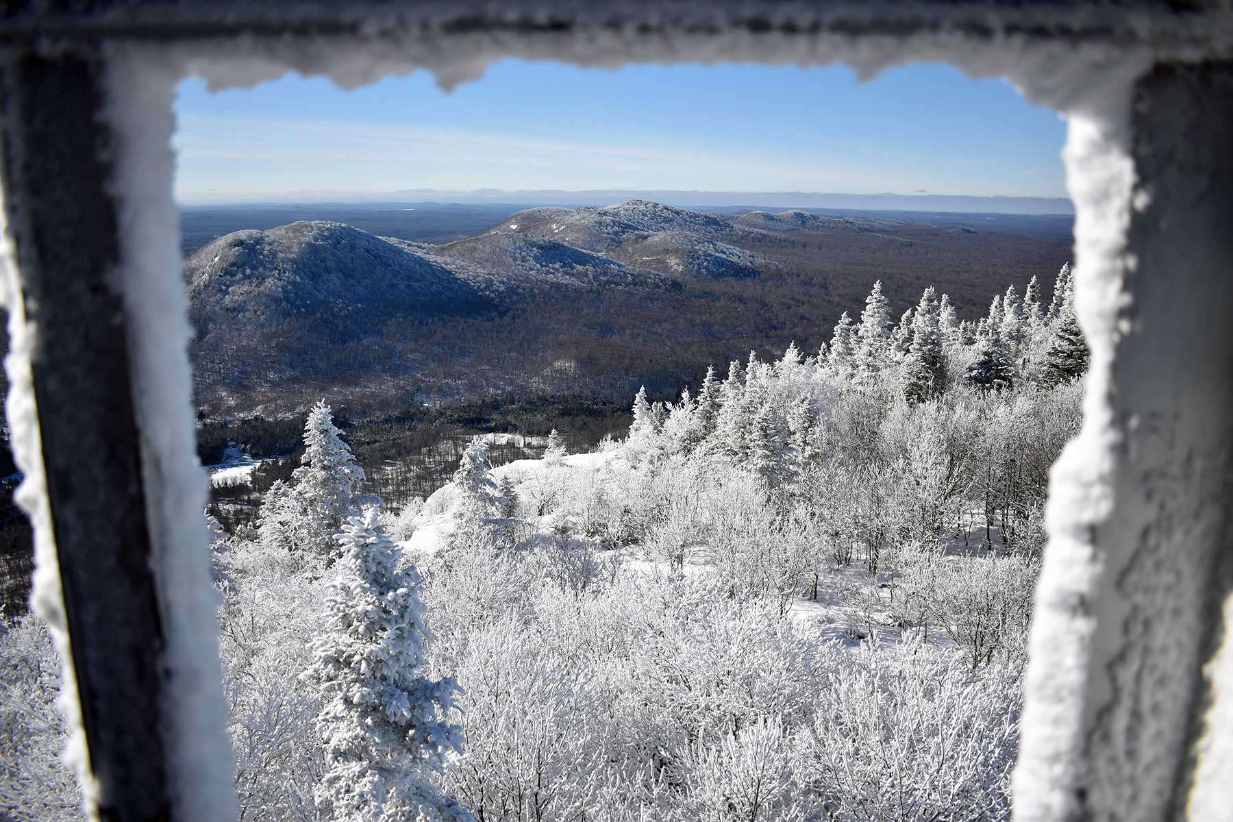 Looking east from the Fire Tower Cab on Azure Mountain toward Brushy Top, Lost, and Flat Top Mountains.