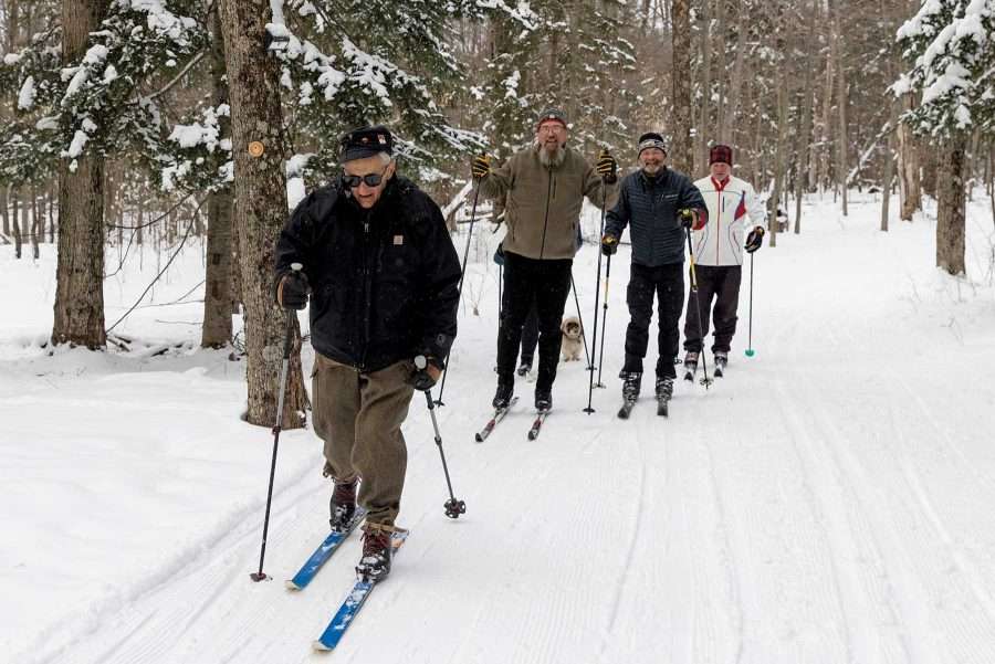 frenette family on the ski trail in tupper lake