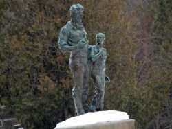 A statue of abolitionist John Brown and an African American child at John Brown Farm in North Elba.