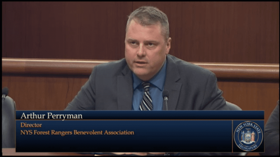 Arthur Perryman, forest ranger with the state Department of Environmental Conservation and a union representative, testifies before lawmakers on Feb. 14 during an environmental conservation budget hearing at the New York State Capitol in Albany. Photo screenshot from the New York State Legislature live stream