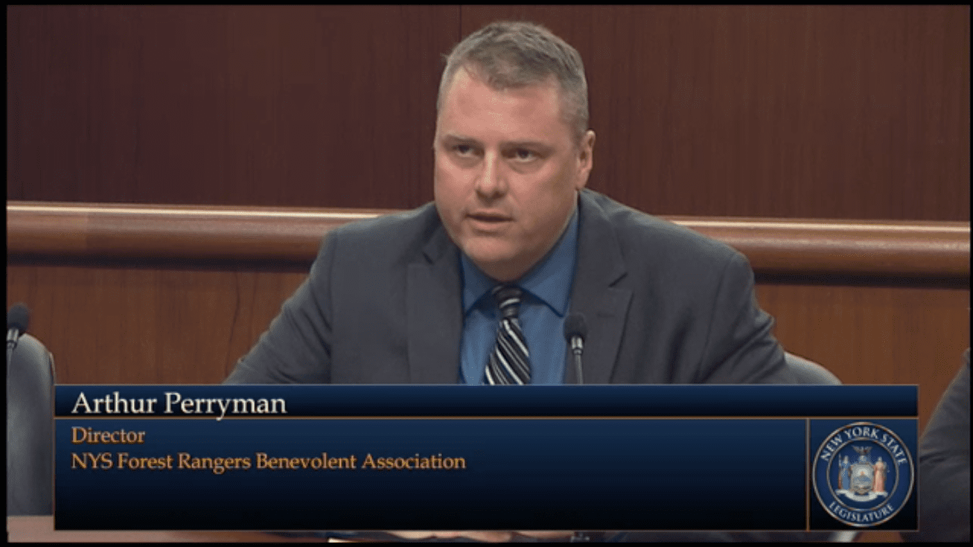 Arthur Perryman, forest ranger with the state Department of Environmental Conservation and a union representative, testifies before lawmakers on Feb. 14 during an environmental conservation budget hearing at the New York State Capitol in Albany. Photo screenshot from the New York State Legislature live stream