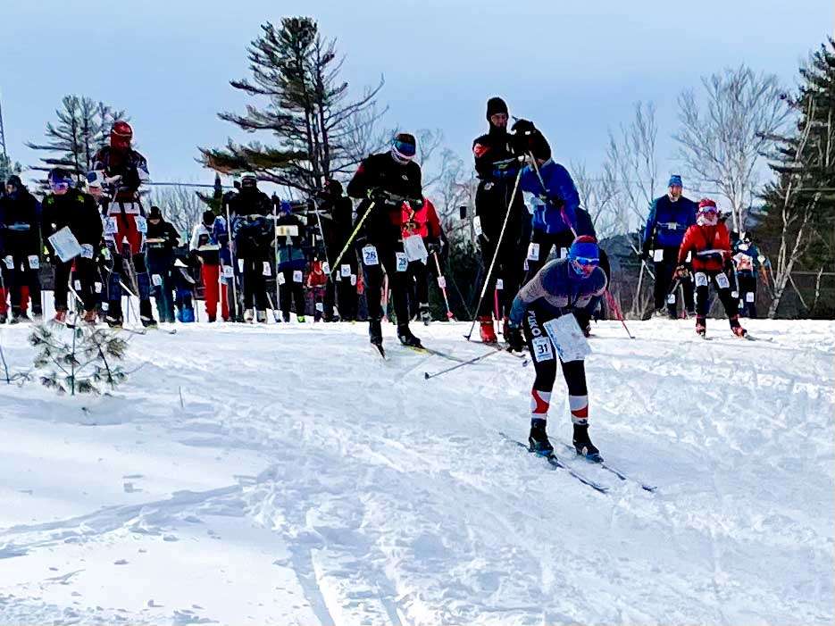 Skiers take off at the start of the orienteering race at Dewey Mountain in Saranac Lake.
