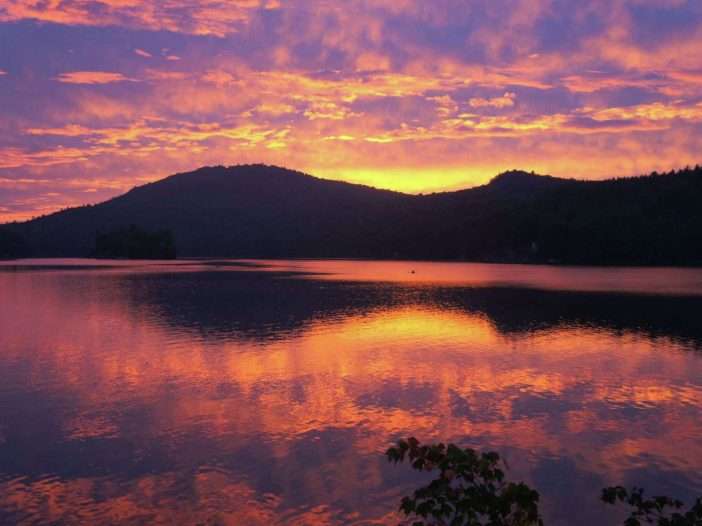 The sun sets over Eagle Lake near Ticonderoga in the Adirondacks.