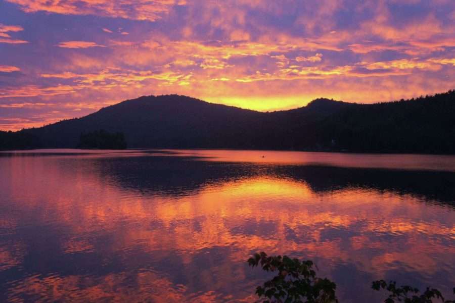 The sun sets over Eagle Lake near Ticonderoga in the Adirondacks.