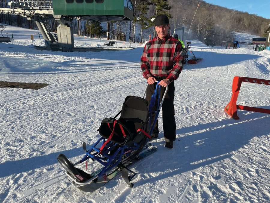 James "Jimmer" Hayes handles the
adaptive skiing bi-ski at Gore Mountain.