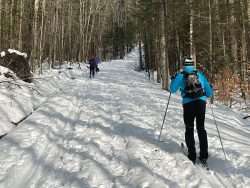 two people on a ski trail