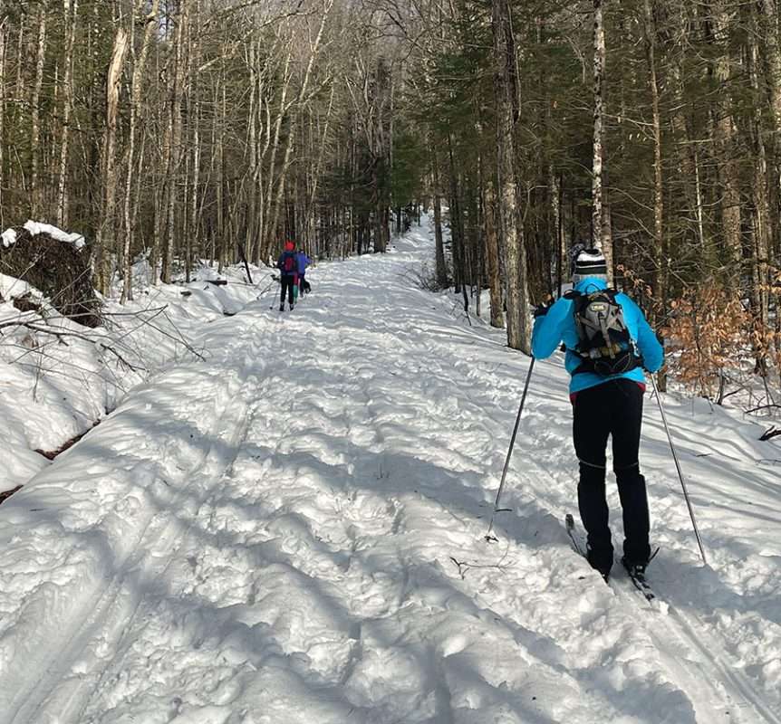 two people on a ski trail