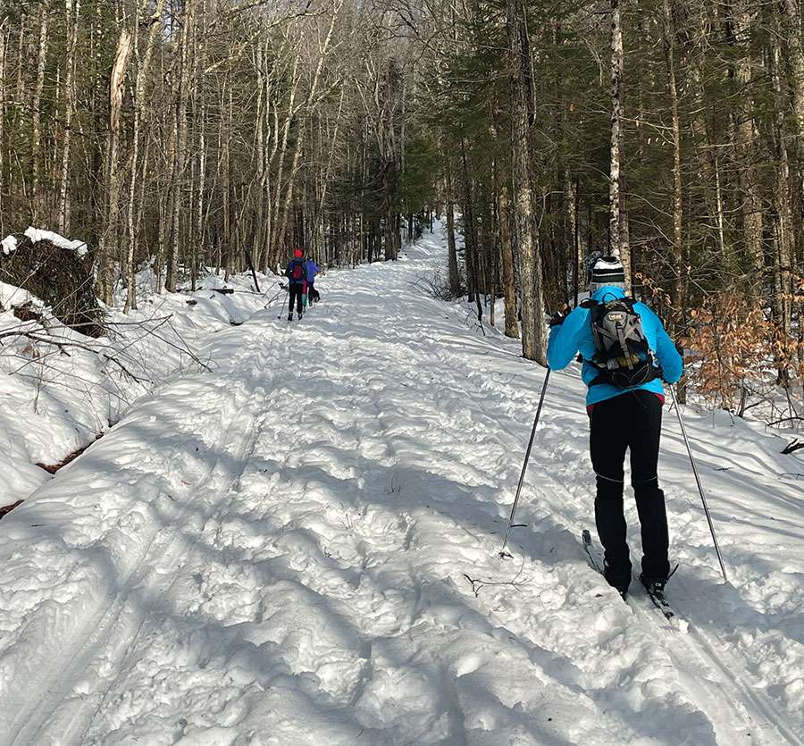two people on a ski trail