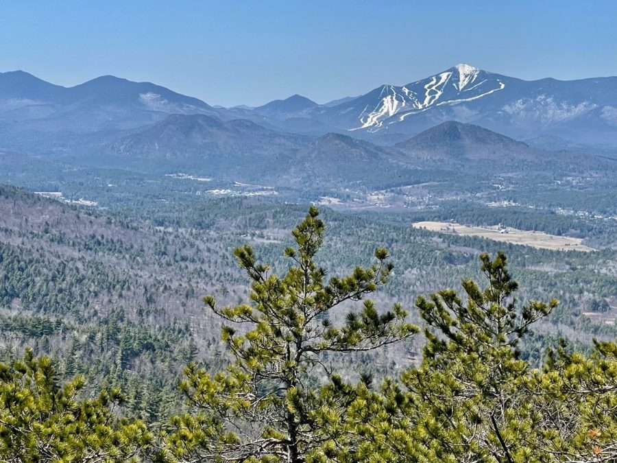 The East Branch of the Ausable River Valley and Foupeaks in the foreground, with Whiteface in the distance.