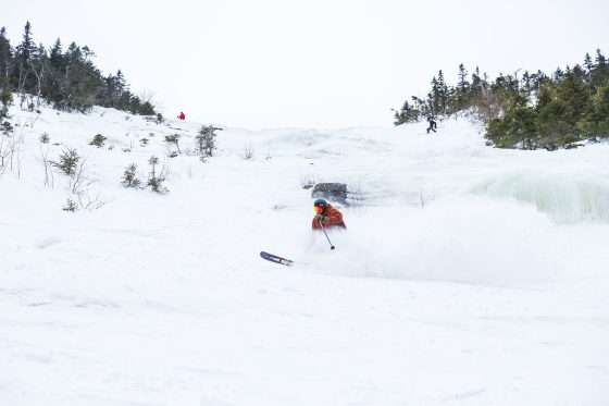 a man skiing the slides