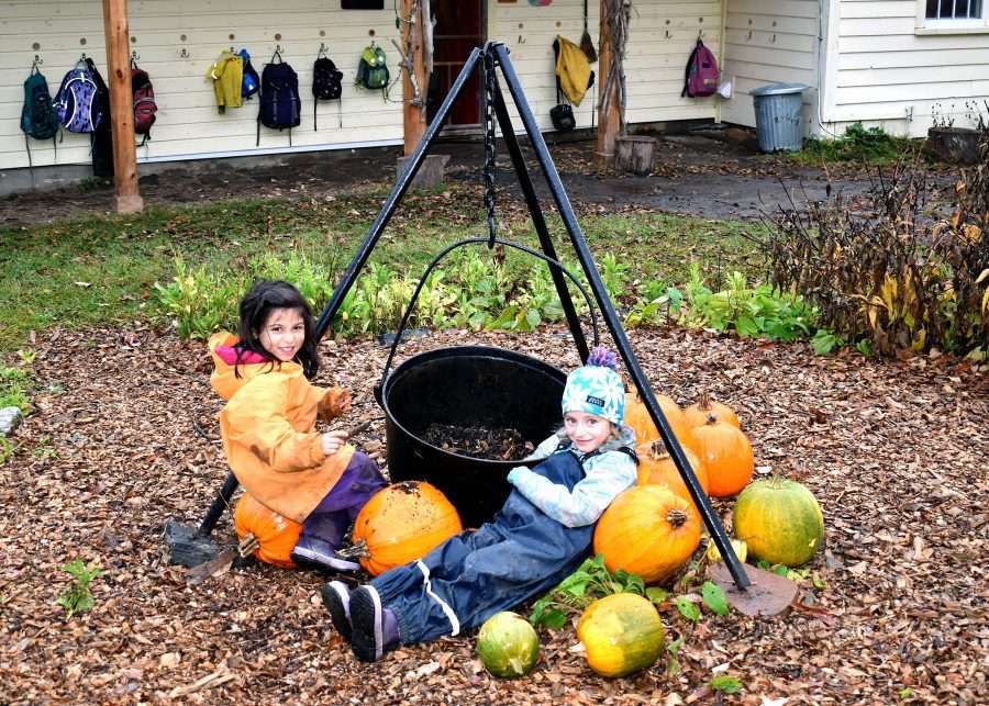 students with pumpkins