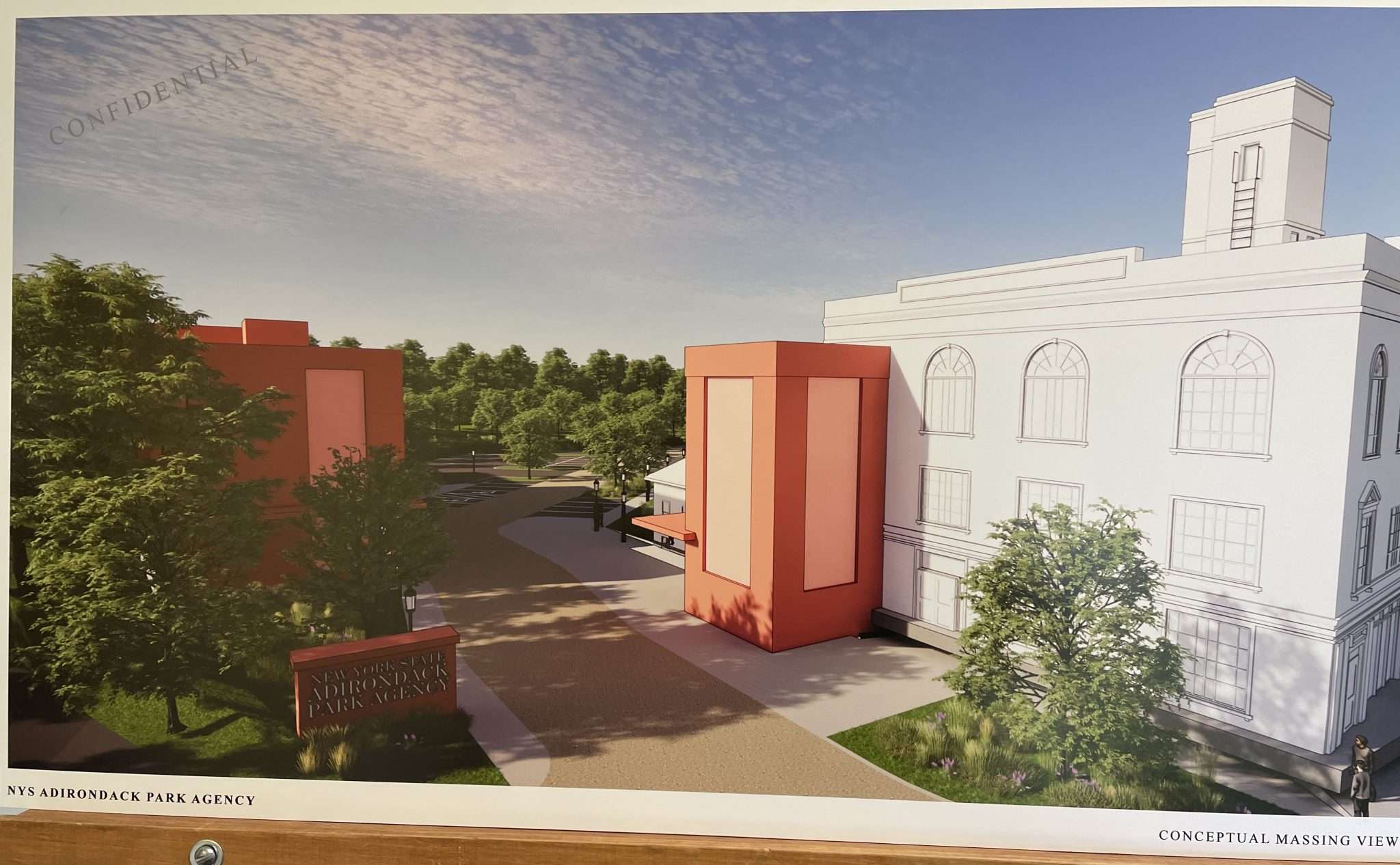 A rendering shows the Paul Smith's Power and Light Building at 1-3 Main St. in the village of Saranac Lake as the Adirondack Park Agency's new headquarters with an addition to accommodate a new elevator. The agency would also build a 19,000-square-foot addition behind it and a new parking lot.