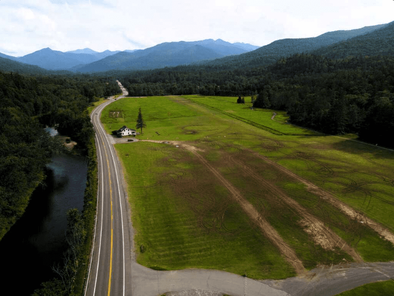 field with ruts in it
