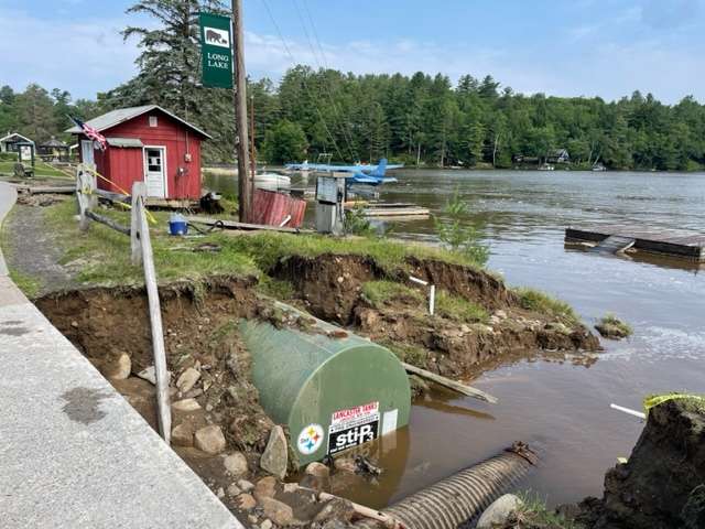 Long Lake's beach was eroded by rain runoff.