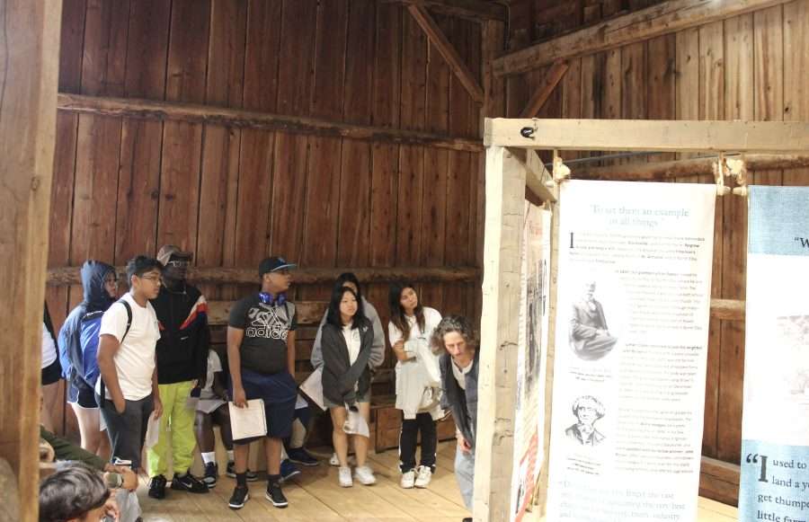 Students gather in a barn to learn about Timbuctoo in the Adirondacks.