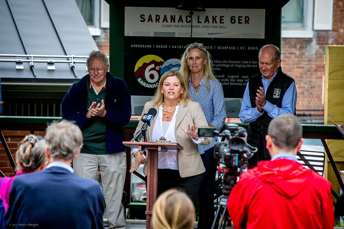 Cali Brooks, Adirondack Foundation president and CEO, announces the Adirondack Small Business Opportunity Fund in Saranac Lake Monday morning. Behind her, left to right, are: Lee Keet, chair of Cloudsplitter Foundation's Board of Trustees; Lori Bellingham, VP of Community Impact for Adirondack Foundation; and Craig Weatherup, of the Weatherup Family Trust.