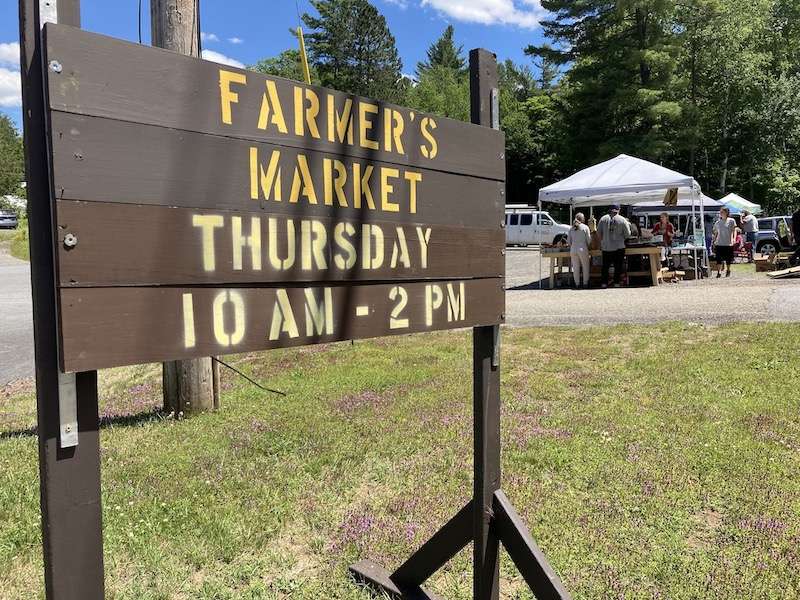 A farmers market sign in the Adirondacks.