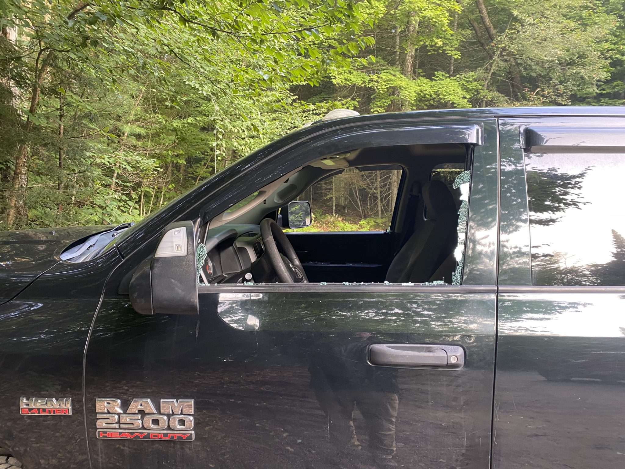 Police found five vehicles at Long Pond in the town of Santa Clara with windows smashed. Photo provided