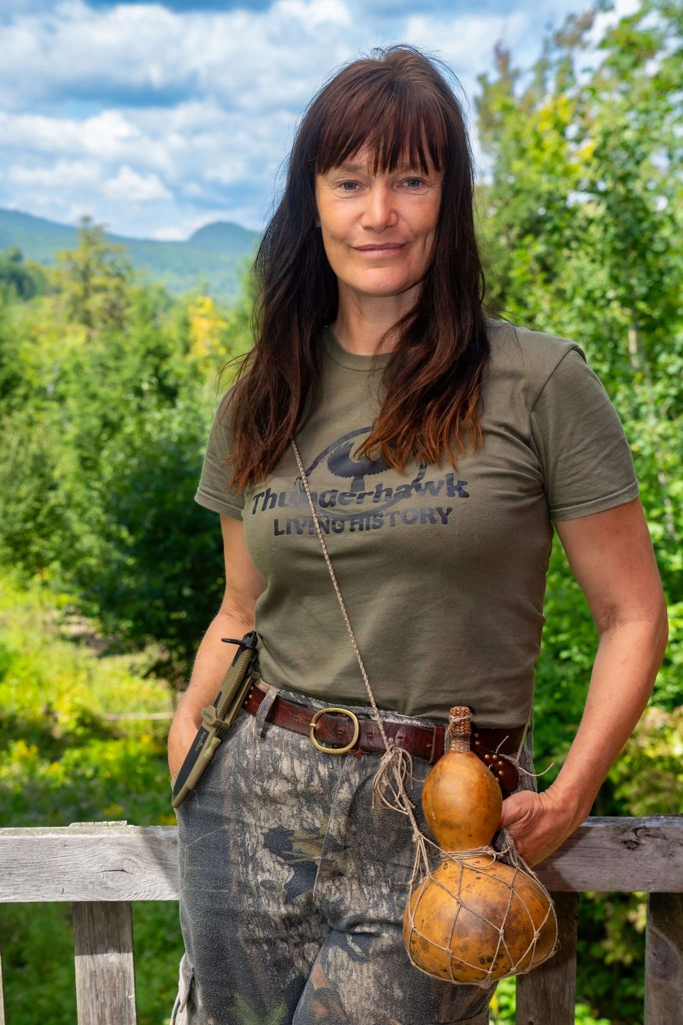 Melanie Sawyer, a contestant on the History Channel show "Alone," is rarely without a firestarter knife and uses a gourd lined with beeswax for water. She teaches wild food foraging, primitive survival, and does historic reenactment through Thunderhawk Living History and Wild Foods and Wilderness.