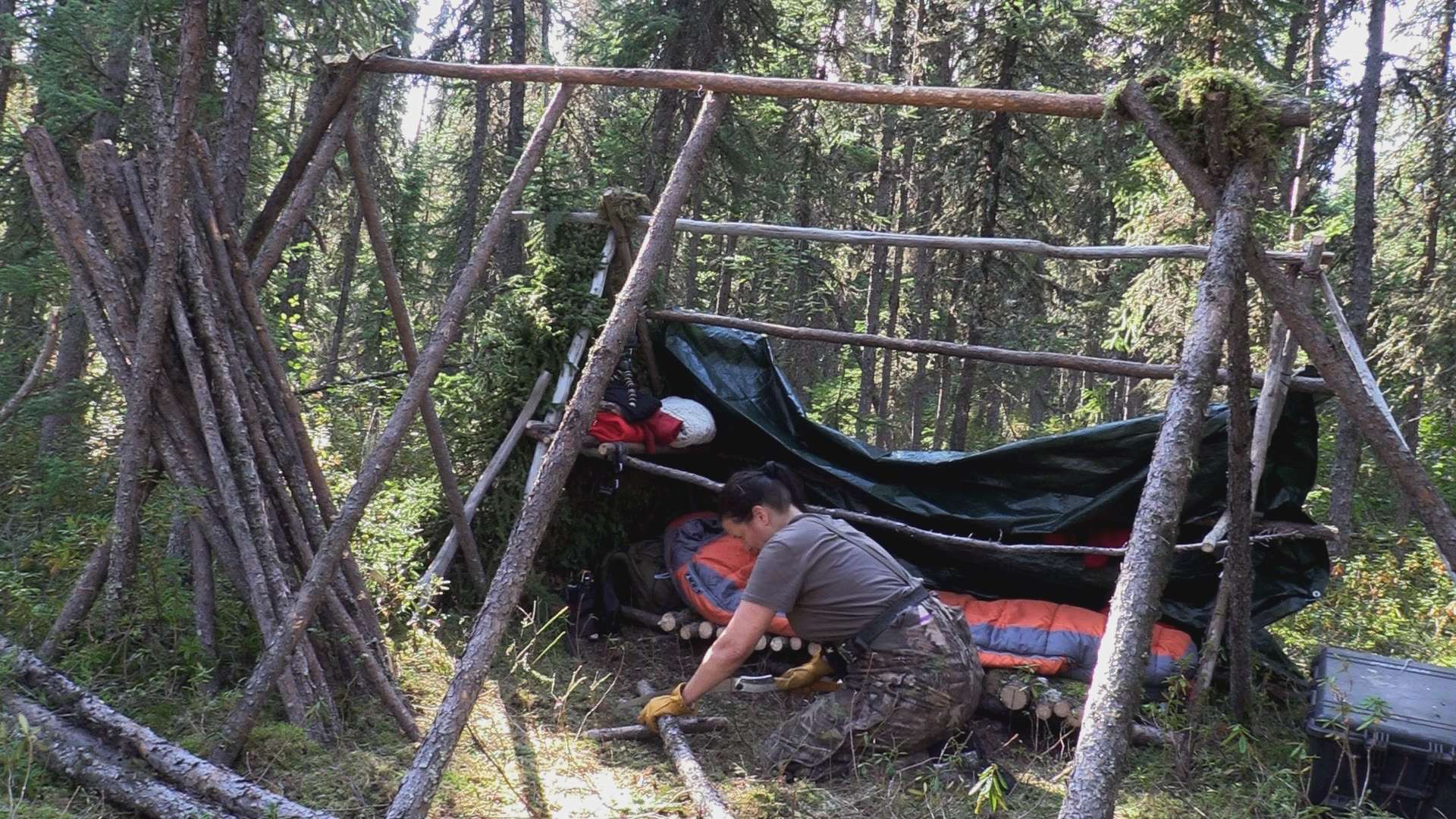 Melanie Sawyer builds her shelter in the Canadian wilderness on Season 10 of the History Channel's show "Alone."